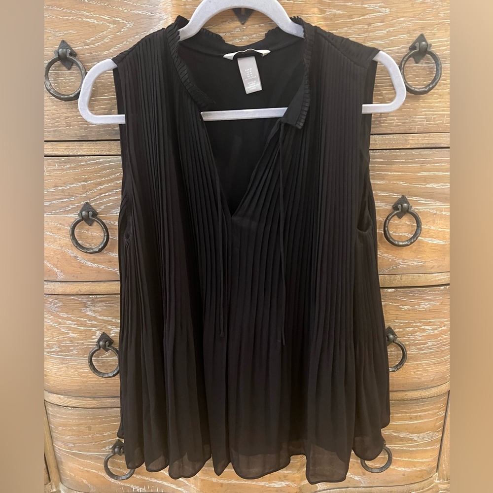 Never worn black H&M top with liner in size M